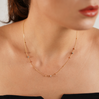 Halskette aus 18 Karat Gelb-, Weiß- und Roségold mit Kugeln und Diamanten
