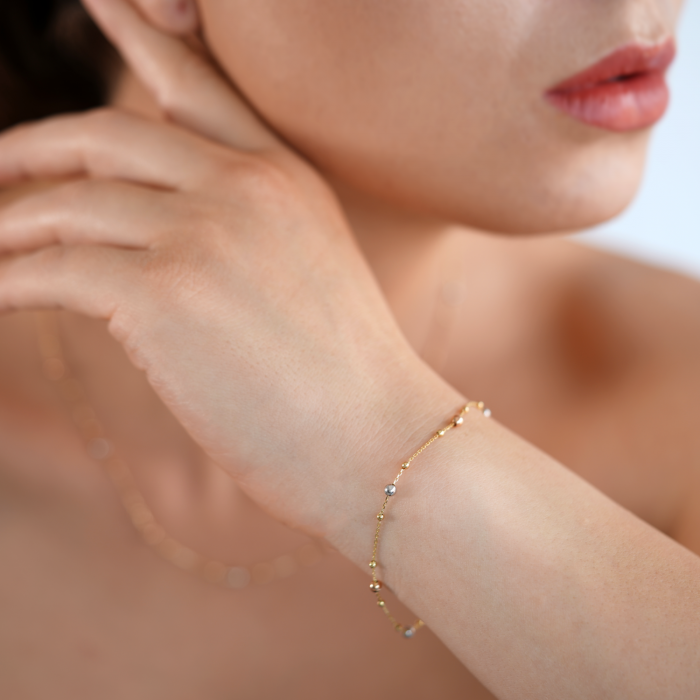 Halskette mit Kugeln aus 18 Karat Gelb-, Weiß- und Roségold Halskette mit Kugeln aus 18 Karat Gelb-, Weiß- und Roségold