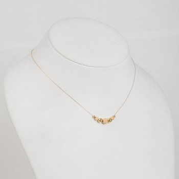 Halskette aus 14 K Gelbgold mit glasierten Kugeln und glatten Kugeln