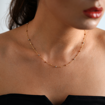 Halskette aus 18 K Gelbgold mit gelben, weißen und rosa Kugeln