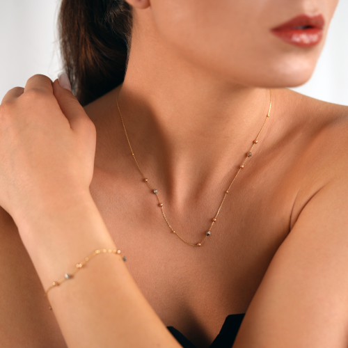 Halskette aus 18 Karat Gelb-, Weiß- und Roségold mit Kugeln und Diamanten