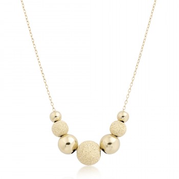 Halskette aus 14 K Gelbgold mit glasierten Kugeln und glatten Kugeln