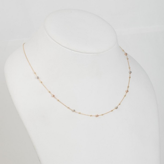 Halskette mit Kugeln aus 18 Karat Gelb-, Weiß- und Roségold Halskette mit Kugeln aus 18 Karat Gelb-, Weiß- und Roségold